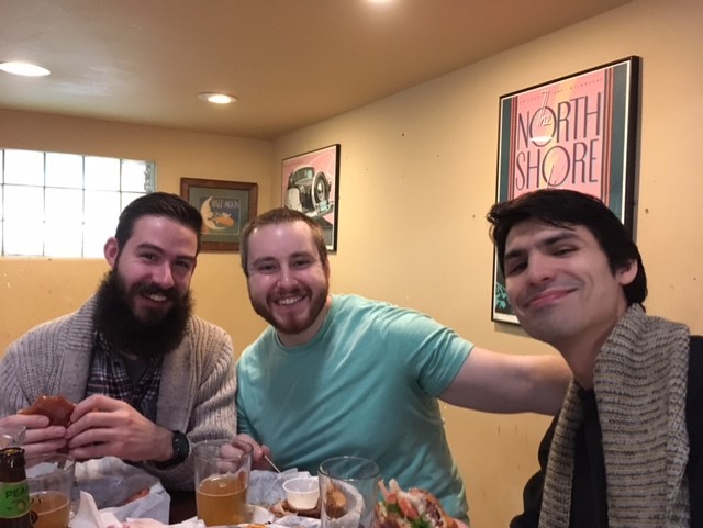 Lab members smile for the camera while out to eat.