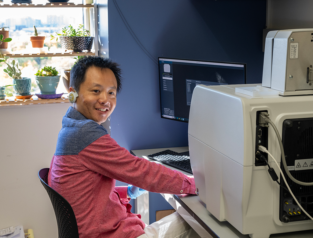 Dr. Zhao Zheng smiles for the camera while at work.